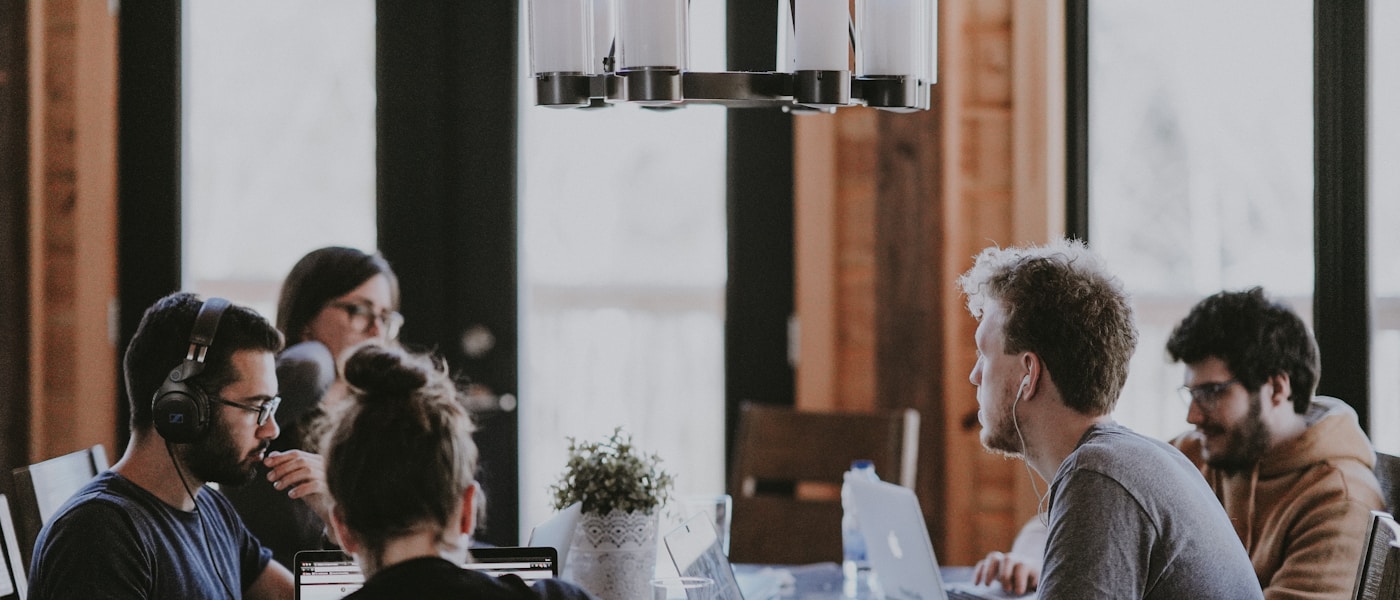 Consultants collaborating on digital strategy in a modern office